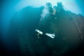   diver returning stern SS President coolidge Espirito Santo Vanuatu. Vanuatu  